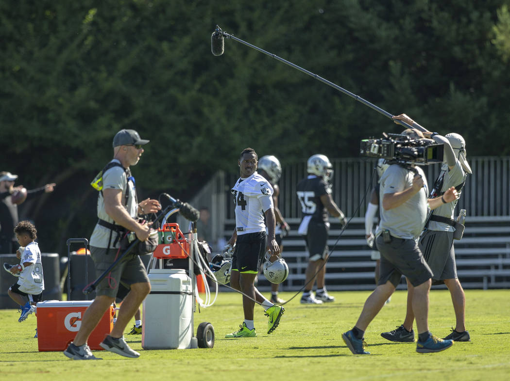 Oakland Raiders wide receiver Antonio Brown (84) walks on the sideline as an HBO Hard Knocks cr ...