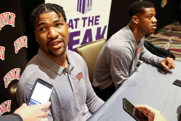 UNLV quarterback Armani Rogers, talks to reporters during Mountain West football media days at ...
