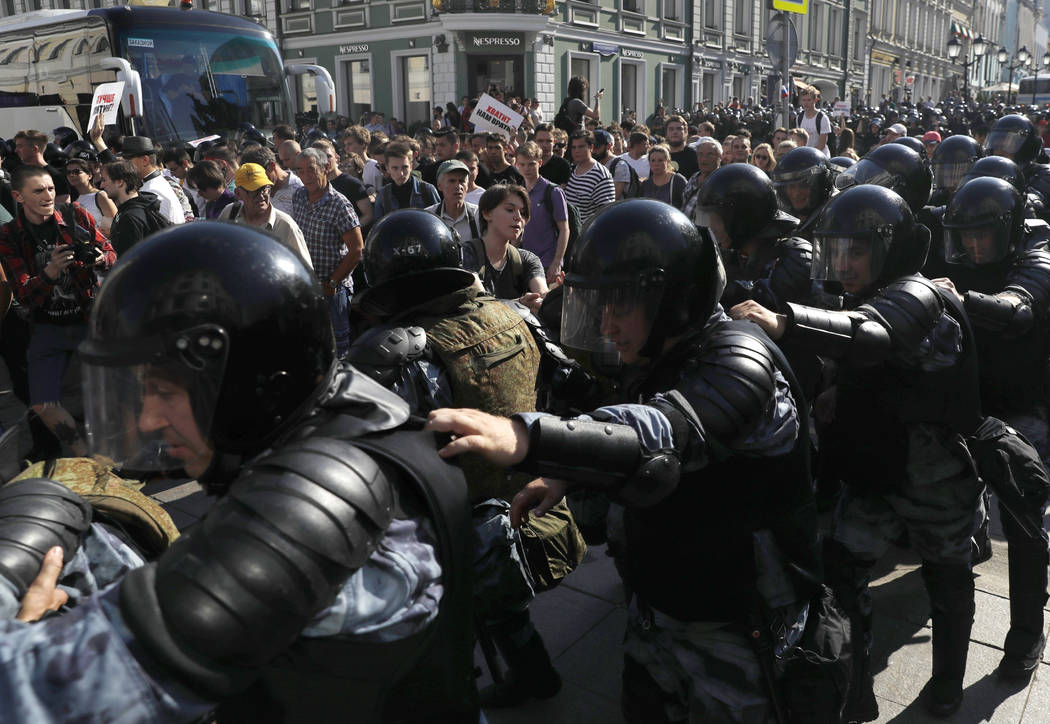 In this file photo dated Saturday, July 27, 2019, police block a street during an unsanctioned ...