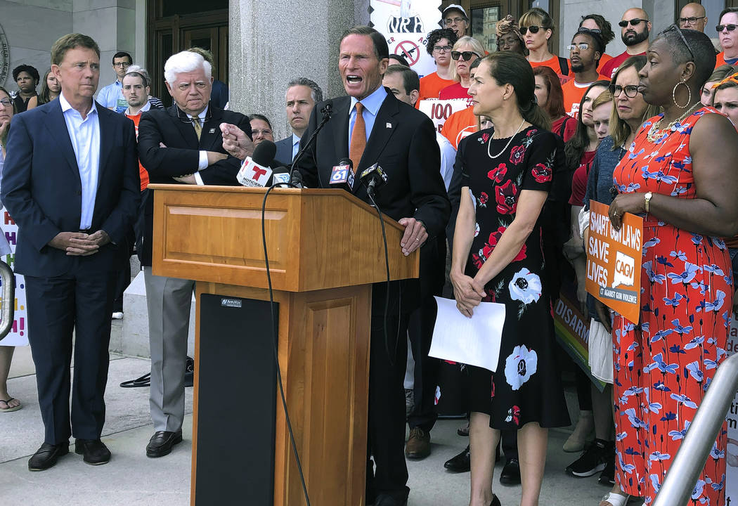 Senator Richard Blumenthal, center, speaks Monday, Aug. 5, 2019, outside the Capitol in Hartfor ...