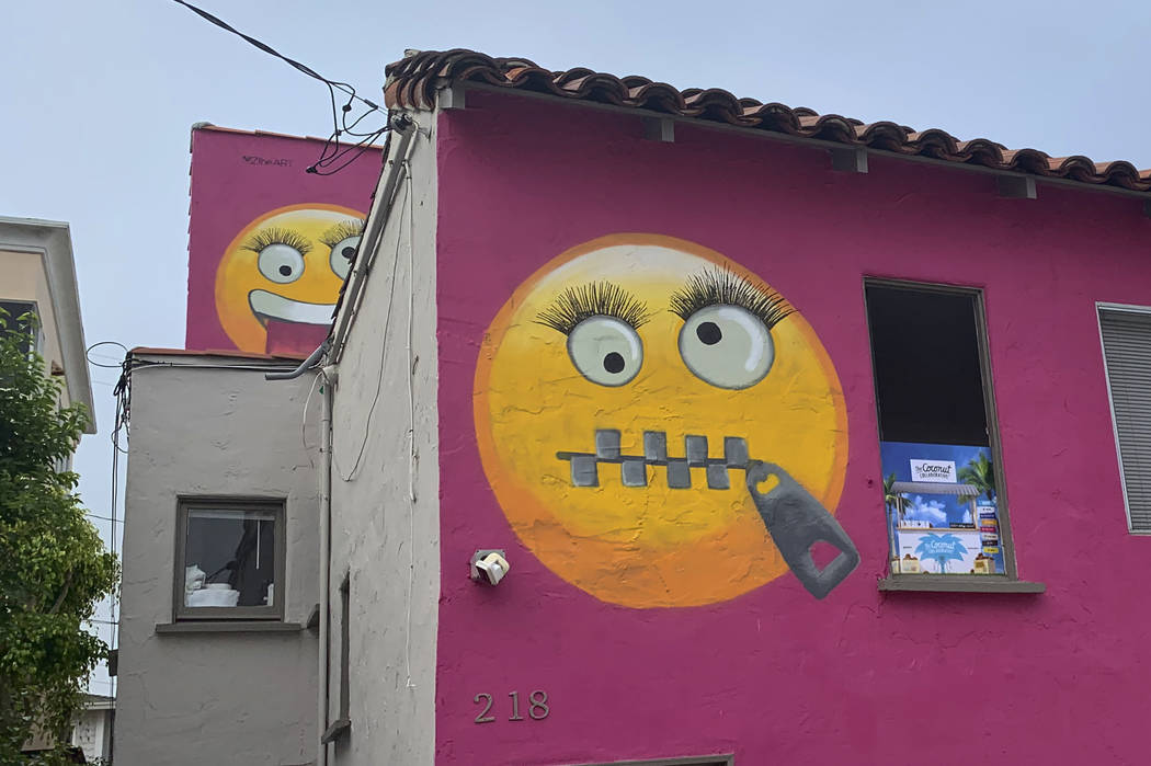 Painted emoji are seen on a house in Manhattan Beach, Calif. on Wednesday, Aug. 7, 2019. The So ...