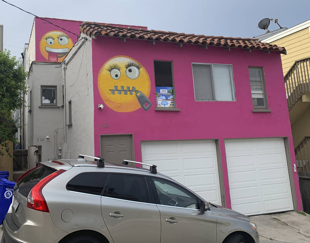 Painted emoji are seen on a house in Manhattan Beach, Calif. on Wednesday, Aug. 7, 2019. The So ...