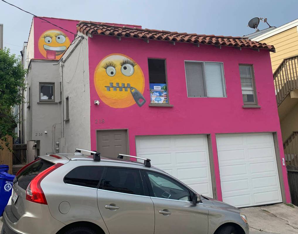 Painted emoji are seen on a house in Manhattan Beach, Calif. on Wednesday, Aug. 7, 2019. The So ...