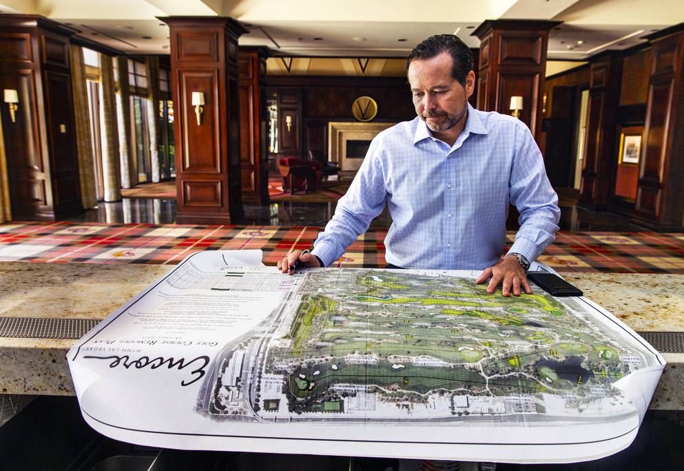 Wynn Las Vegas Executive Director of Golf Operations Brian Hawthorne views a map of Wynn Golf C ...