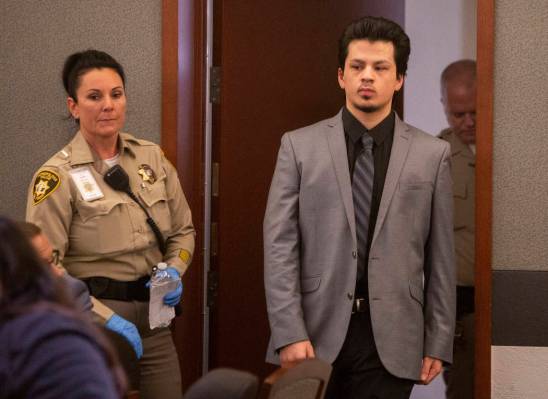 Jaiden Caruso walks back for the verdict in his murder trial at the Regional Justice Center on ...