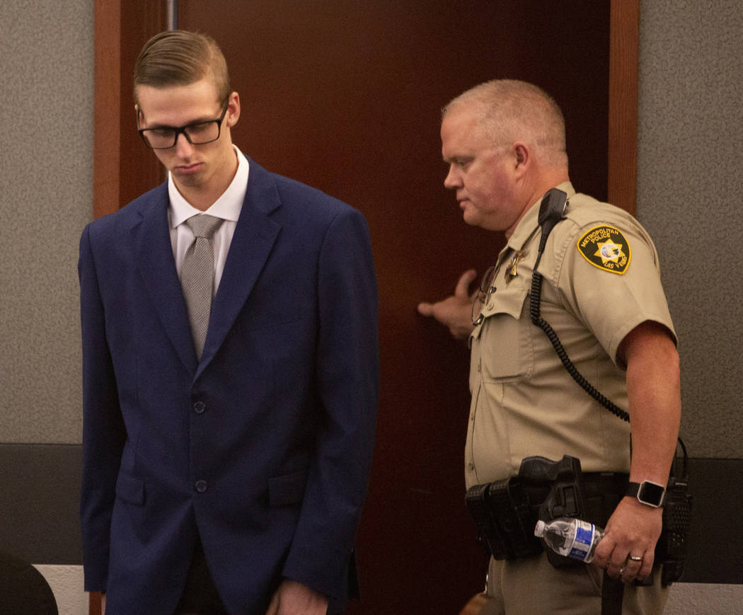 Kody Harlan walks back for the verdict in his murder trial at the Regional Justice Center on We ...
