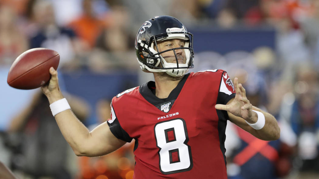 Atlanta Falcons quarterback Matt Schaub passes the ball during the first half against the Denve ...