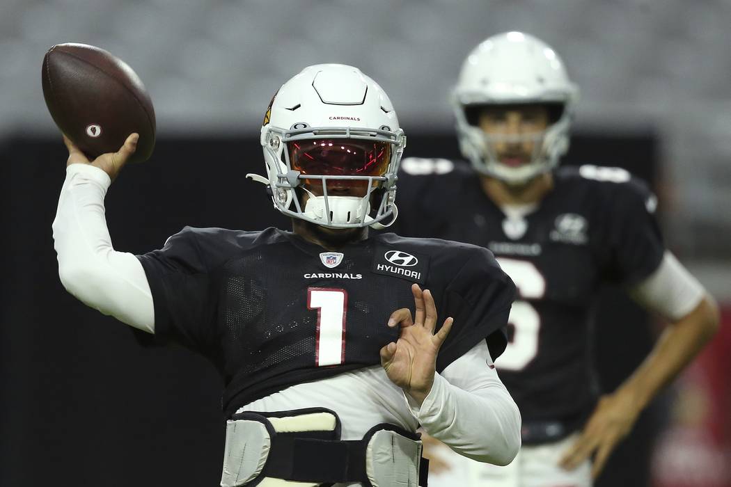 Arizona Cardinals quarterback Kyler Murray throws the ball during an NFL football training camp ...