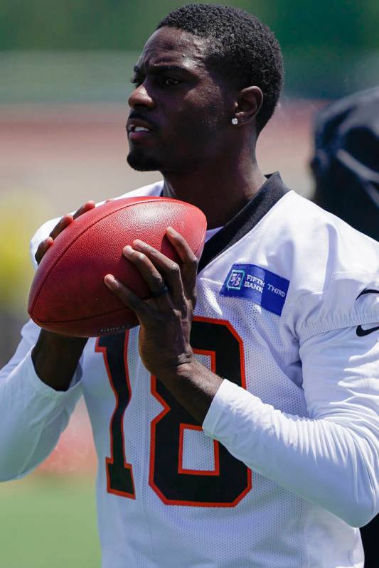 Cincinnati Bengals wide receiver A.J. Green (18) catches a pass before practice on the first da ...