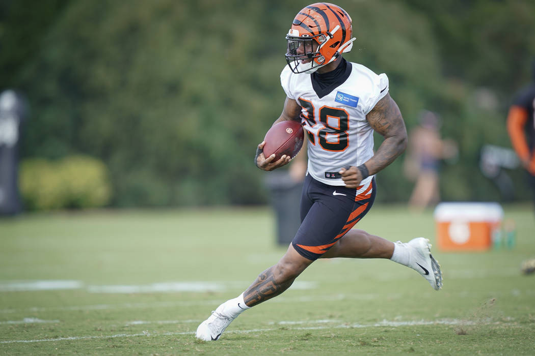 Cincinnati Bengals running back Joe Mixon (28) runs during a play during NFL football training ...