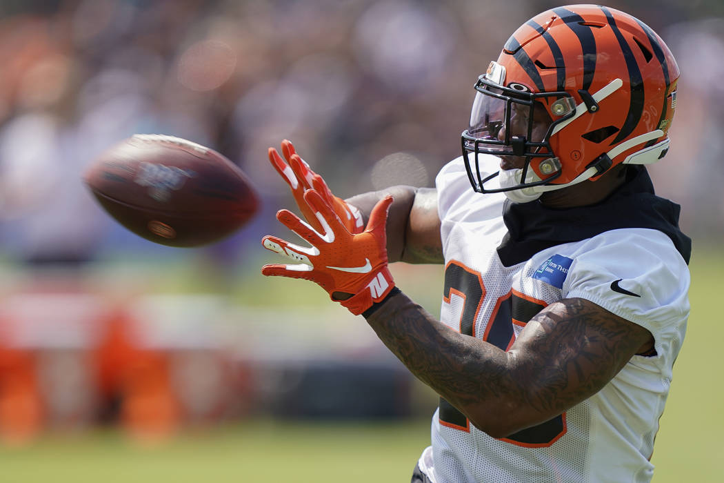 Cincinnati Bengals running back Joe Mixon (28) catches a ball during NFL football training camp ...