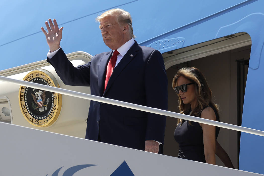 President Donald Trump and first lady Melania Trump arrive at El Paso International Airport to ...