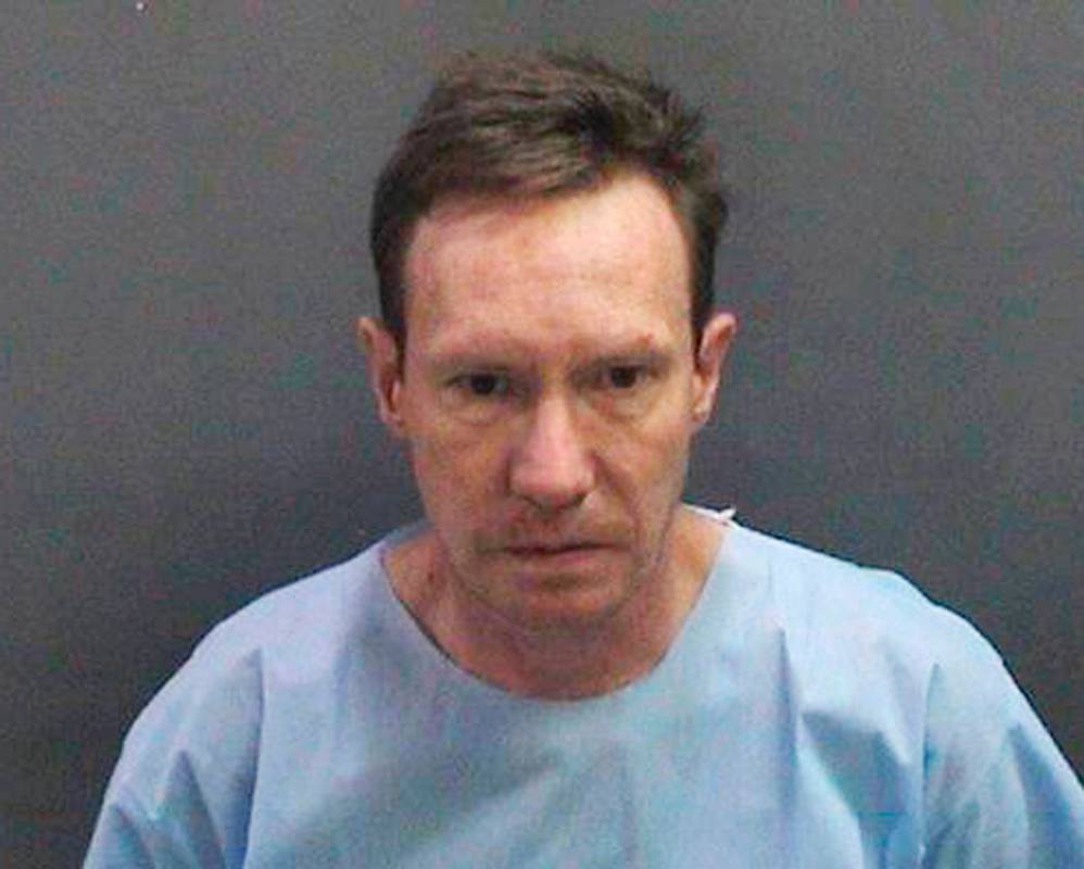 This undated booking photo provided by the Newport Beach, Calif., Police Department shows Peter ...