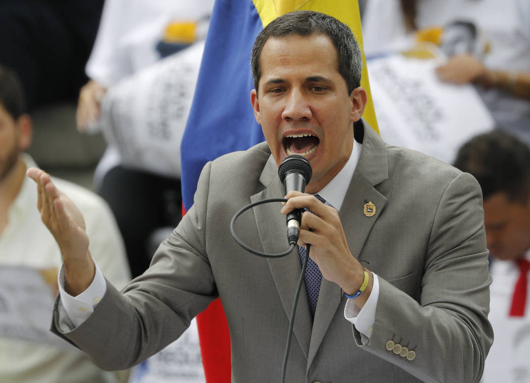 Opposition leader and self-proclaimed interim President of Venezuela Juan Guaido speaks during ...