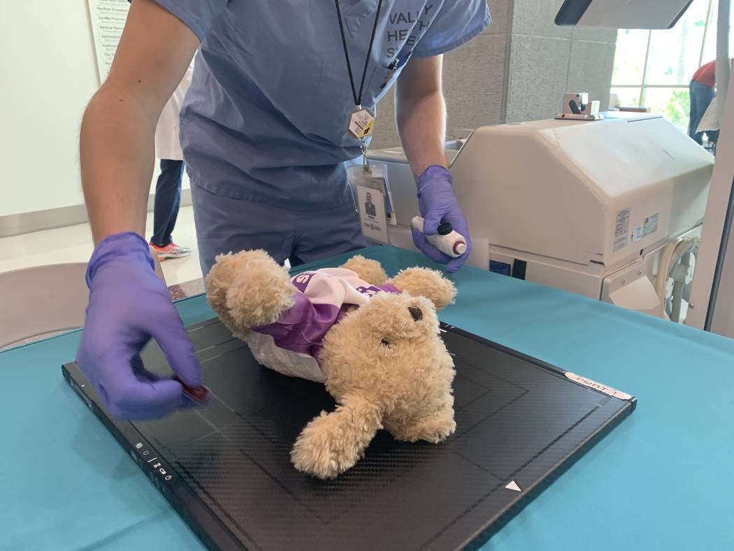 Hospital staff performed X-Rays, breathing treatments and broken limb repairs to teddy bears on ...