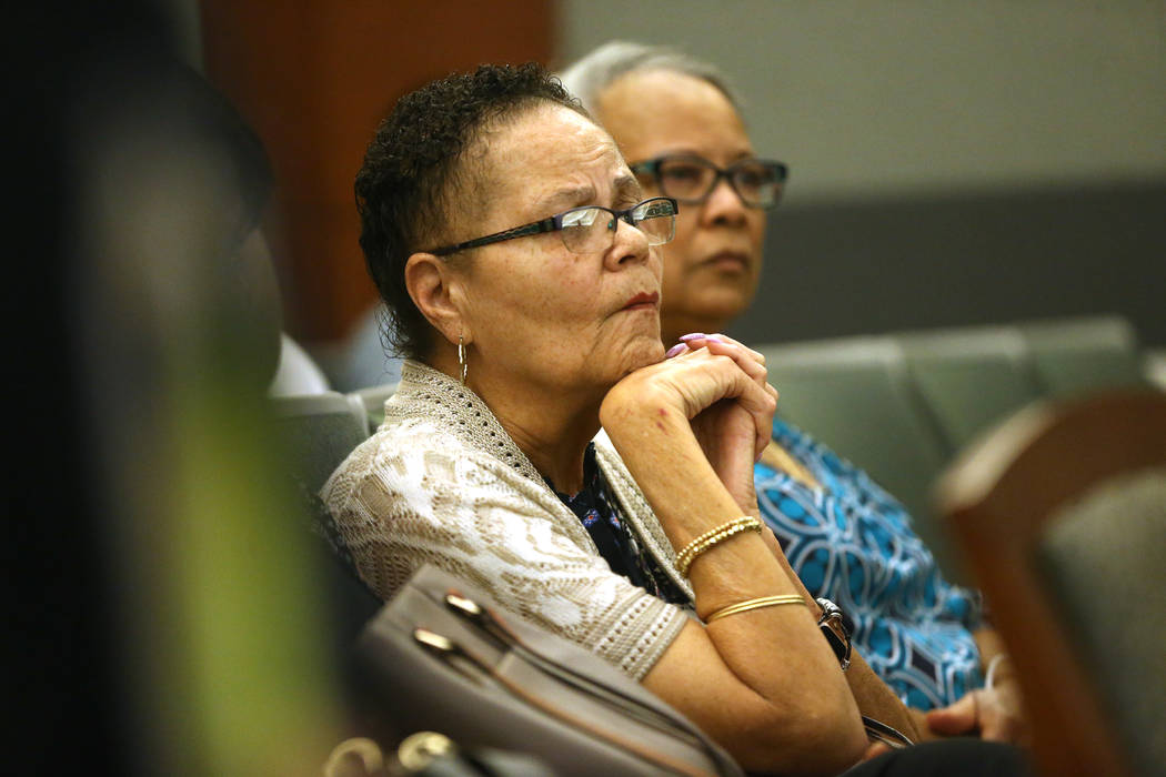 Dell Harris, with her cousin Kathy Clayton, listens to arguments for the case involving her bro ...