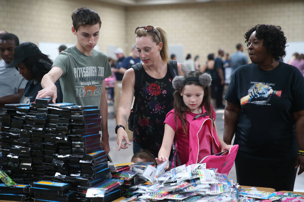 Jennifer Sinatra, second from left, with her children Zachery George, left, 14, Bella Sinatra, ...