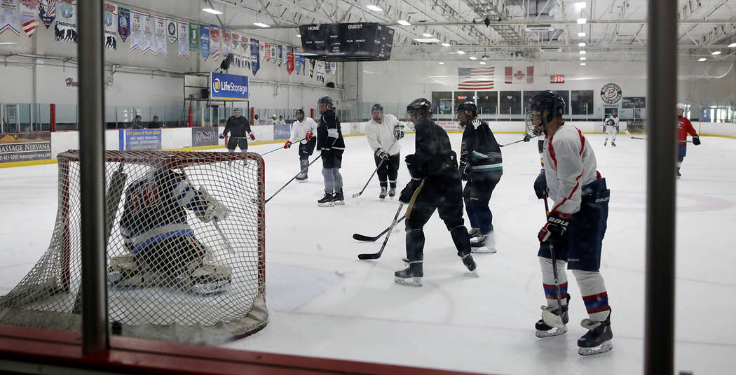 Ronnie's Hockey Club plays a pickup ice hockey game at the Las Vegas Ice Center in Las Vegas on ...