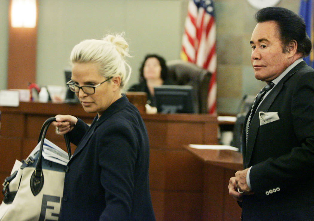Kathleen Newton, left, and her husband, Wayne, leave the courtroom of Elizabeth Gonzalez at the ...
