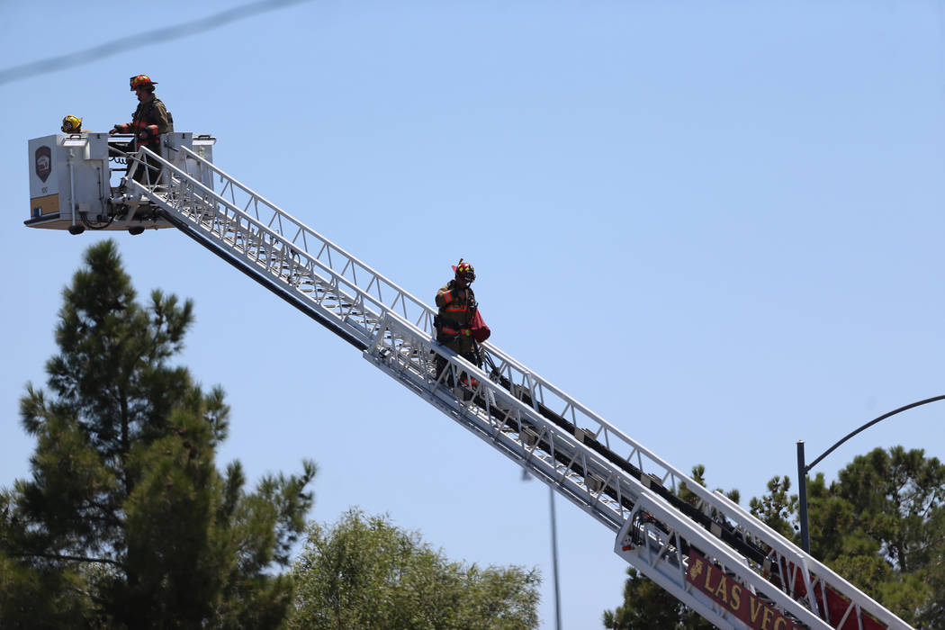 The scene of a structural fire near the intersection of Losee Road and West Lake Mead Boulevard ...