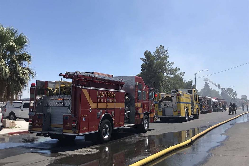 The scene of a structural fire near the intersection of Losee Road and West Lake Mead Boulevard ...