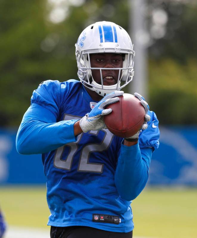 Detroit Lions tight end Brandon Barnes catches a pass during NFL football training camp in Alle ...