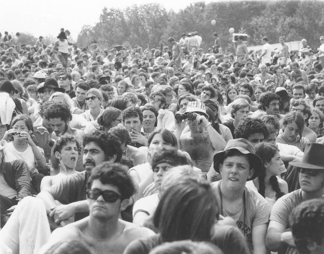 This is a view of part of the crowd at the Woodstock Music and Arts Festival held on a 600-acre ...
