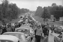 Hundreds of rock music fans jam highway leading from Bethel, New York, Aug. 16, 1969, as they t ...