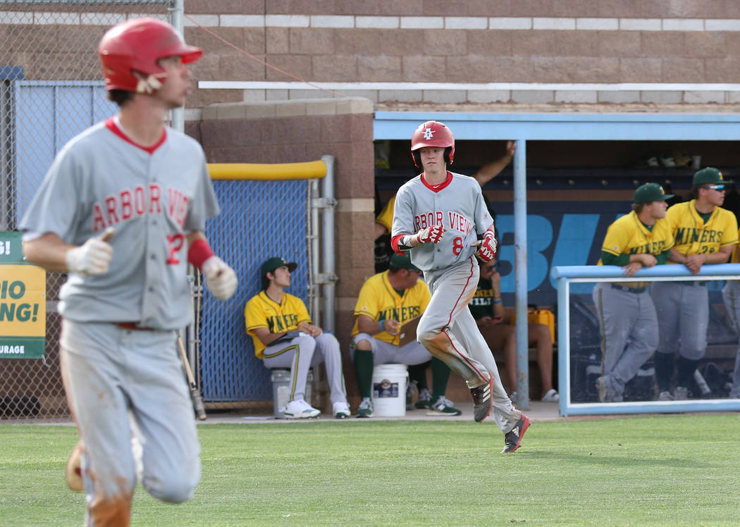 Arbor View's Payton Brooks (8), right, who played for the Mountain Ridge team during the 2014 L ...