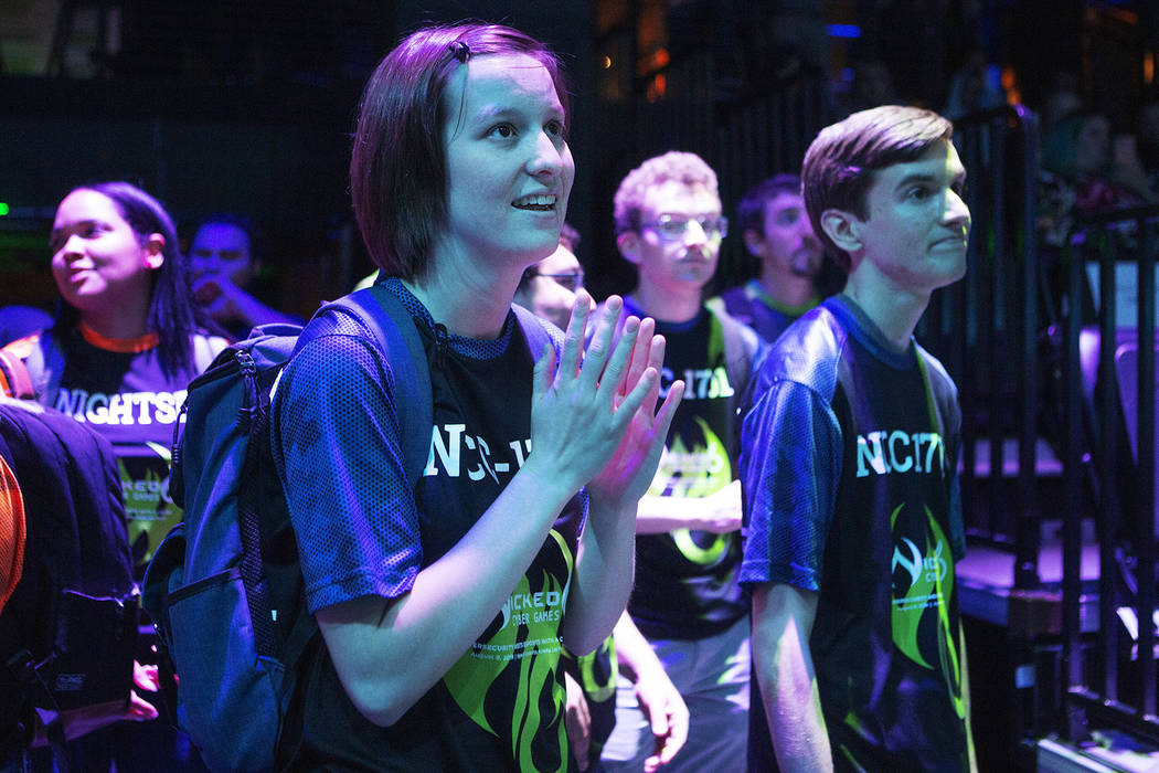 Jamie Poston, 23, left, from the University of Nevada Reno, waits in anticipation with members ...