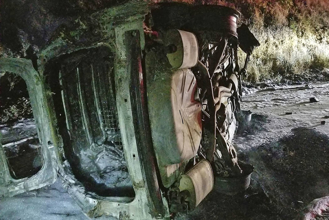 A Humboldt County Sheriff's Department patrol car is seen after it was struck by a falling bear ...