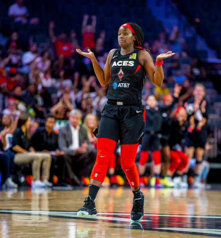 Las Vegas Aces guard Sugar Rodgers (14) isn't surprised by a great basket over the Connecticut ...