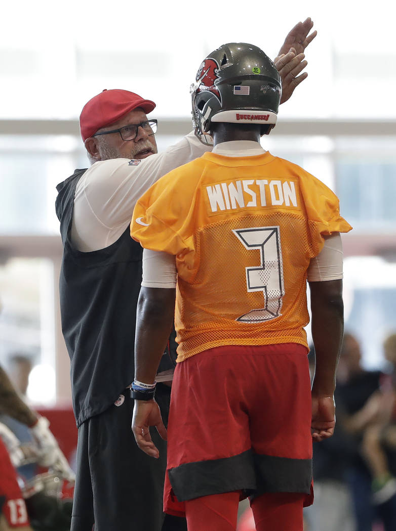 Tampa Bay Buccaneers head coach Bruce Arians talks to quarterback Jameis Winston (3) during an ...