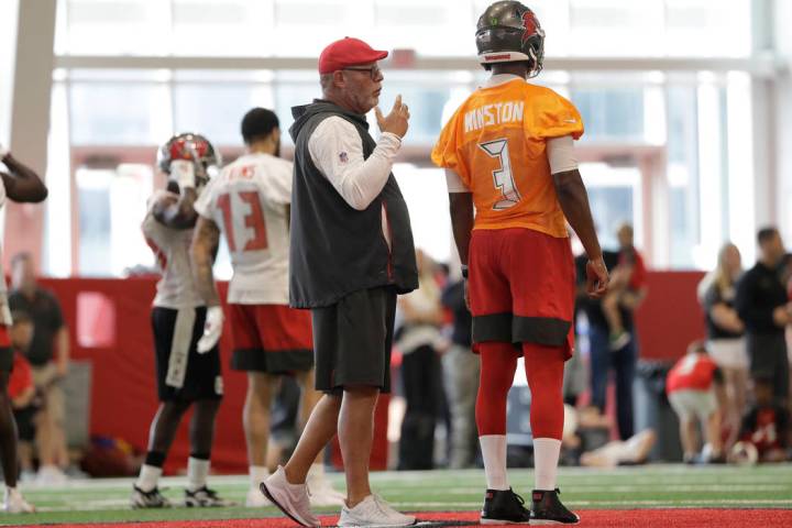 Tampa Bay Buccaneers head coach Bruce Arians talks to quarterback Jameis Winston (3) during an ...