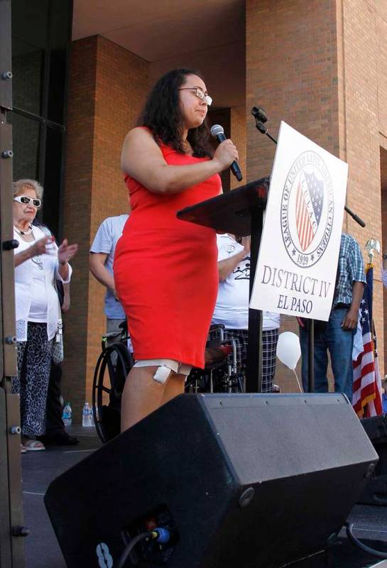 Jessica Coca Garcia stands in front of her wheelchair addressing those gathered at the League o ...