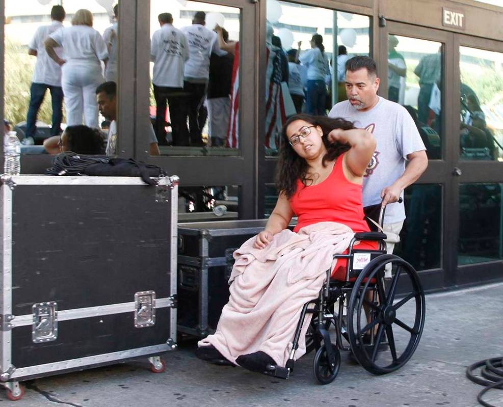 Jessica Coca Garcia is wheeled away after speaking at League of United Latin American Citizens' ...