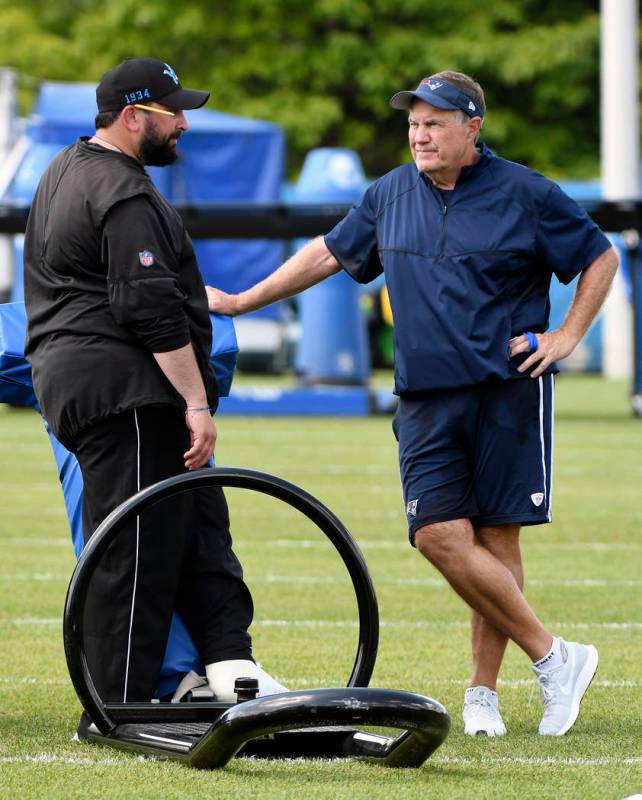 Detroit Lions head coach Matt Patricia, left, and New England Patriots head coach Bill Belichic ...