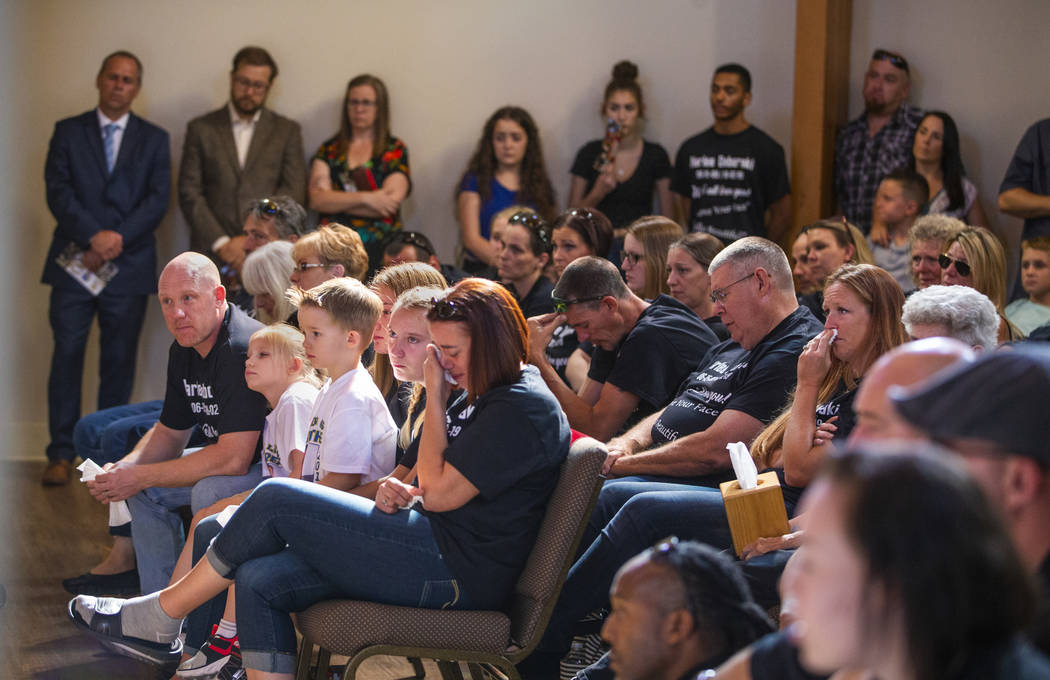 Family members and friends are emotional during the funeral service for Harlee Deborski as many ...