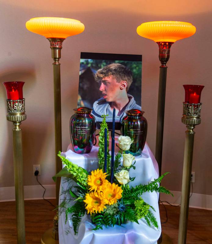 Urns and portrait of Harlee Deborski are the centerpiece during a funeral service for him in th ...