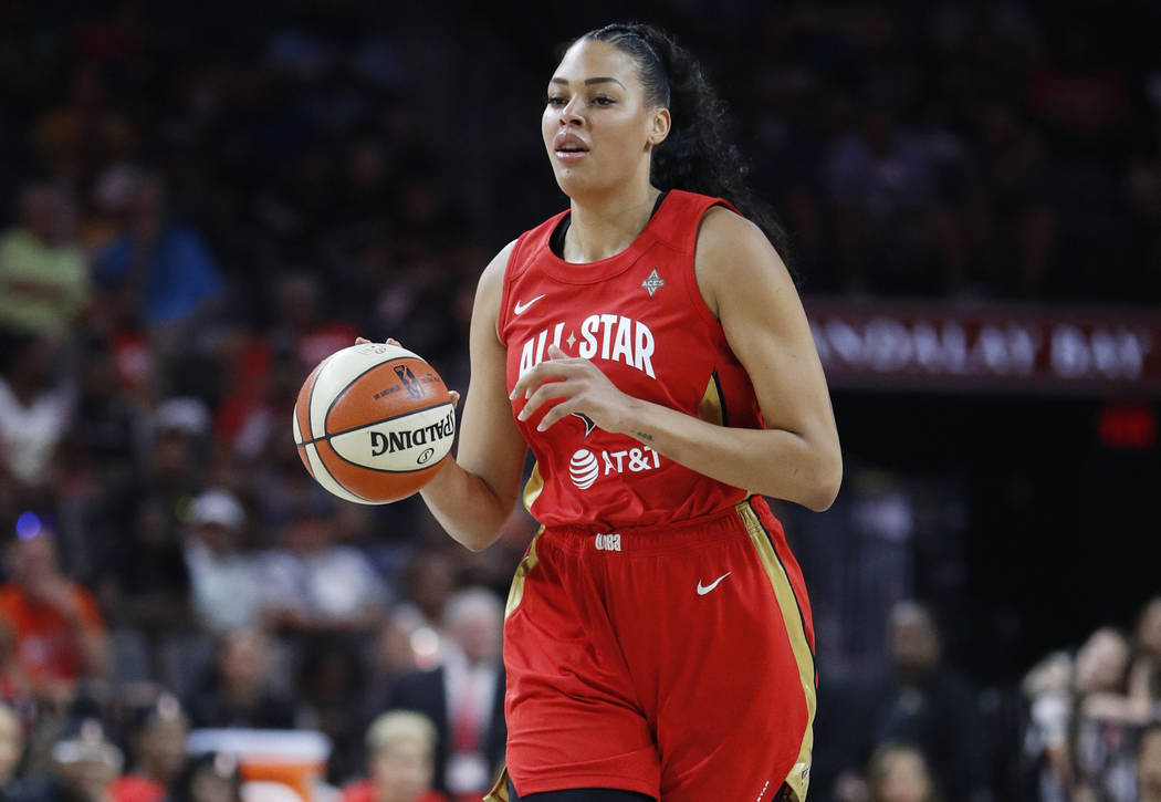 Las Vegas Aces' Liz Cambage, of Team Wilson, drives upcourt against Team Delle Donne during the ...
