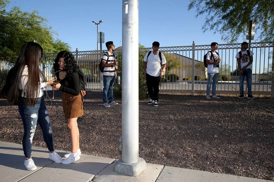 Sunrise Mountain High School senior Azaleah Saldana, left, and her sister Nevaeh Saldana, a sop ...