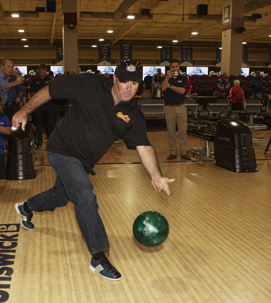 Professional stock car racer Brendan Gaughan eyes his shot while bowling at South Point on Mond ...