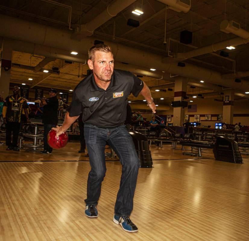 Nascar professional Clint Bowyer eyes his shot while bowling at South Point on Monday, Aug. 12, ...