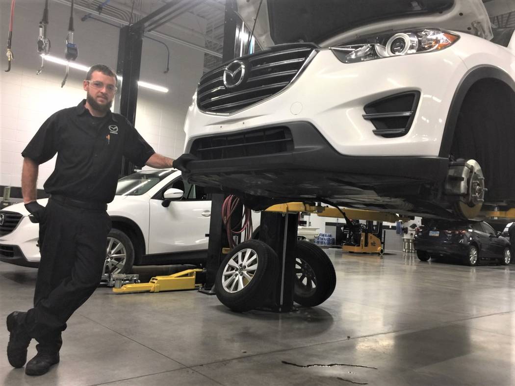 Findlay Mazda technician Tony Tinnell can’t imagine working anywhere else. (Findlay)