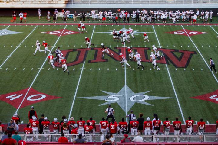 UNLV QB Armani Rogers (1) breaks free for a long run during their first major scrimmage of foot ...