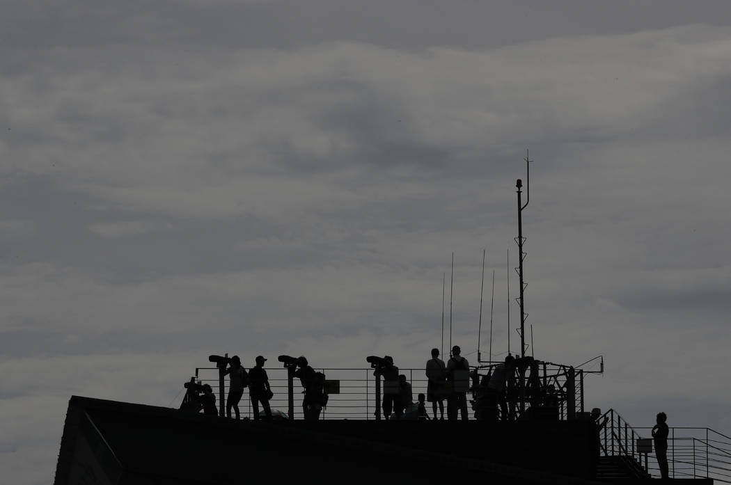 FILE - In this Sunday, Aug. 11, 2019, file photo, visitors watch the North side from the Imjing ...