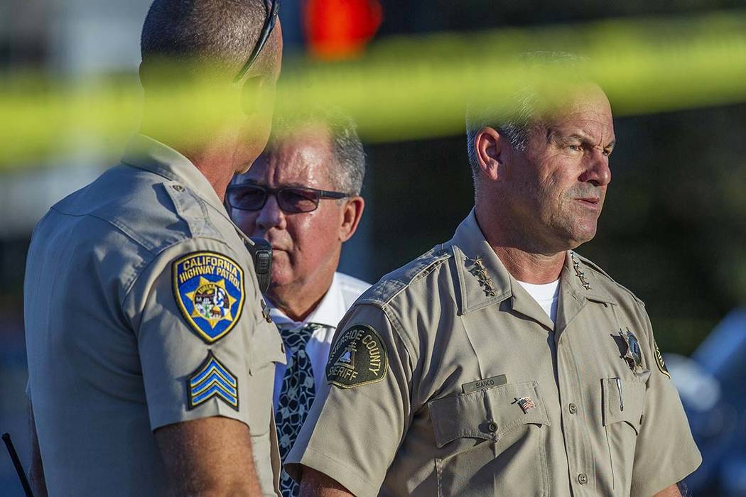 Riverside County Sheriff Chad Bianco, right, with Riverside City Police Chief Sergio G. Diaz, c ...