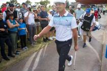 American golfer Bryson DeChambeau walks to the fairway after teeing off from the 17th box durin ...