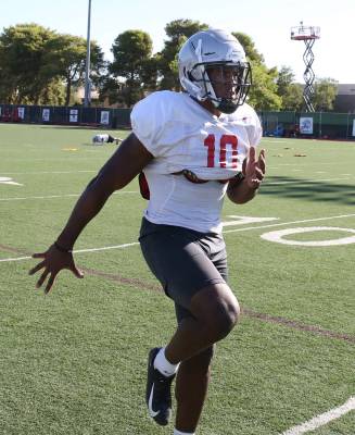 UNLV Rebels wide receiver Darren Woods Jr. (10) warms up during team practice on Tuesday, Aug. ...