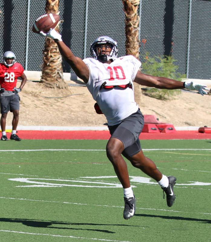 UNLV Rebels wide receiver Darren Woods Jr. (10) catches a pass during team practice on Tuesday, ...